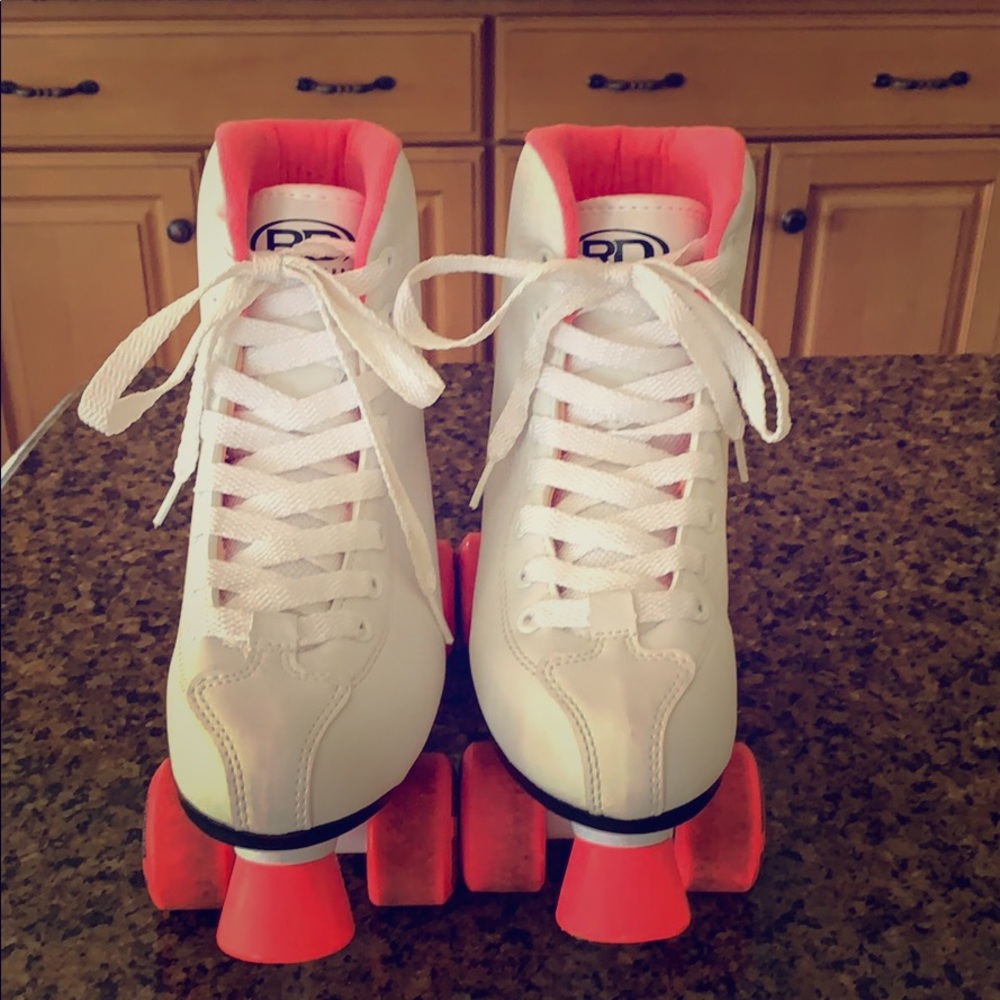 Pink and white roller skates (US size 5)